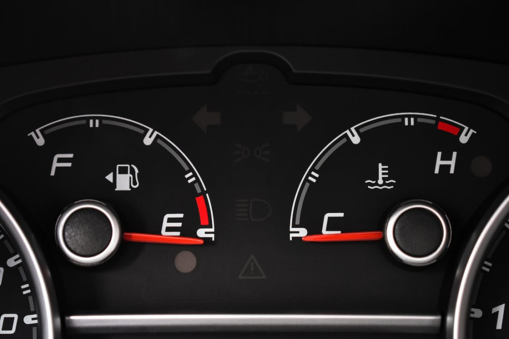 A car with a low fuel indicator